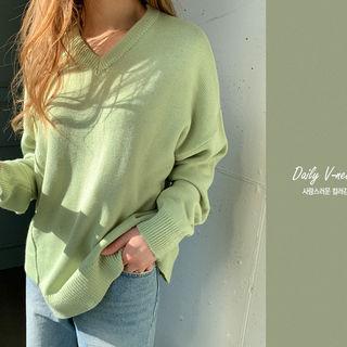 Seam-trim Asymmetric-hem Knit Top