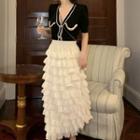 Short-sleeve V-neck Knit Top / Tiered Midi Skirt
