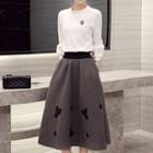 3/4-sleeve Keyhole-back Top / Applique A-line Skirt