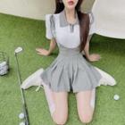 Short-sleeve Polo Shirt / Mini A-line Pleated Skirt / Set
