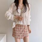 Long-sleeve V-neck Perforated Blouse / High-waist Asymmetric Plaid Skirt