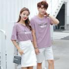 Women Set: Short-sleeve Lettering T-shirt + Asymmetrical A-line Skirt / Men T-shirt / Shorts