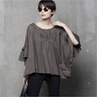 Round-neck Ruffle-sleeve Blouse