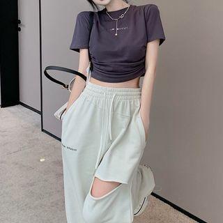 Short-sleeve Lettering T-shirt / Cut-out Wide-leg Pants