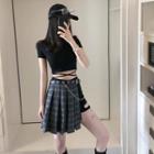 Short-sleeve Cross-strap Crop Top/ Cut Out Plaid Pleated Skirt/ Cut Out Shorts/ Belt