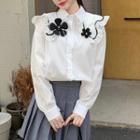 Long-sleeve Ruffled Floral-accent Blouse