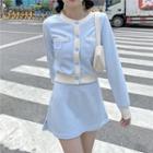 Long-sleeve Color-block Top / Plain Mini Skirt