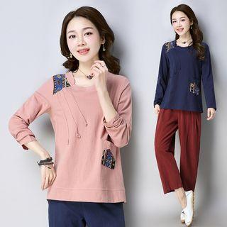Long-sleeve Pattern Paneled Top
