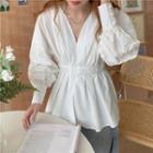Long-sleeve V-neck Faux Pearl Peplum Blouse