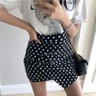 Dotted Asymmetric Hem Mini Skirt