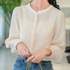 Long-sleeve Buttoned Floral Blouse
