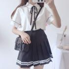Short-sleeve Shirt / Mini Pleated Skirt