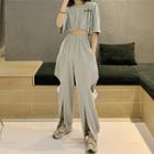 Short-sleeve Cropped Top / Cut-out Sweatpants