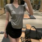 Short-sleeve V-neck T-shirt / Mini Pencil Skirt