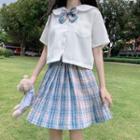 Short-sleeve Tie-neck Shirt / Plaid Mini A-line Pleated Skirt