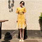 Set: Short-sleeve V-neck Top + Button A-line Skirt