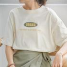 Set: Elbow-sleeve Lettering Print T-shirt + Tie-waist Mini A-line Skirt