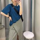 Cut-out-detail Short-sleeve Top / Wrapped Check Skirt
