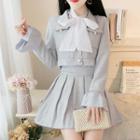 Set: Faux Pearl Button Jacket + Pleated Skirt