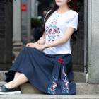 Embroidered Short-sleeve Top / Midi A-line Skirt