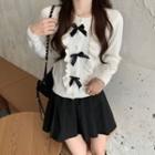 Ribbon Ruffled Cardigan / Pleated Mini A-line Skirt