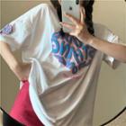 Short-sleeve Heart Print T-shirt / A-line Skirt