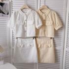 Set: Short-sleeve Single-breasted Top + High-waist Skirt