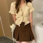 Short-sleeve Ruffle Knit Top / Mini A-line Skirt