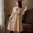 Long-sleeve Ribbon Accent Button-up Midi A-line Dress