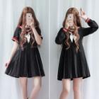 Tie-neck Badge Embroidered A-line Dress