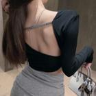 Open-back Long-sleeve Asymmetrical Cropped Top Black - One Size