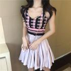 Sleeveless Patterned Cropped Top / Ruffled A-line Mini Skirt