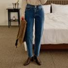 Button-detail Tapered Jeans