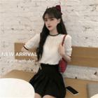 Short-sleeve Heart Cutout Knit Top / Pleated A-line Skirt