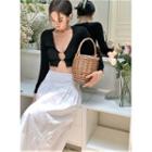 Long-sleeve V-neck Cutout Cropped Top / High-waist A-line Midi Skirt