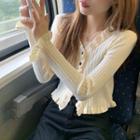 Ruffle Button-up Sweater