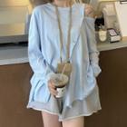 Long-sleeve Button-up Asymmetrical T-shirt