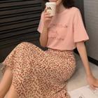 Lettering Short-sleeve T-shirt / Floral Midi A-line Skirt / Set