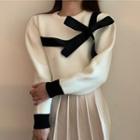 Bow-front Sweater / Pleated Mini A-line Skirt