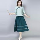 Set: Embroidered Short-sleeve Top + Striped A-line Midi Skirt