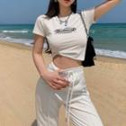 Short-sleeve Lettering Print Cropped T-shirt / Sweatpants