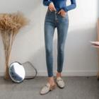Asymmetric-waist Washed Skinny Jeans