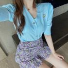Embroidered Short-sleeve Knit Top / Floral High-waist Ruffled-trim Skirt