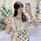 Short-sleeve Lace Top + Patterned Mini Skirt