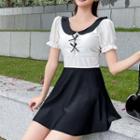 Set: Short-sleeve Open-back Swim Dress + Shorts