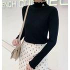 Long-sleeve Frill Trim Letter Embroidered Knit Top