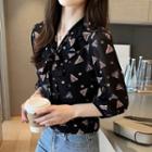 3/4-sleeve Triangle-pattern Tie-neck Blouse