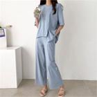 Set: Slit-front T-shirt + Band-waist Pants
