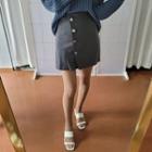 Pleated Buttoned Miniskirt