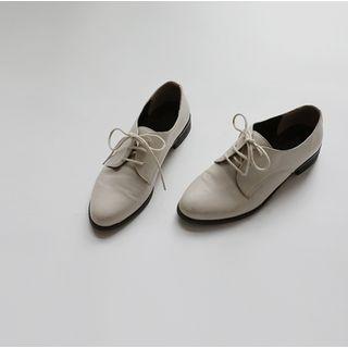 Oval-toe Oxfords
